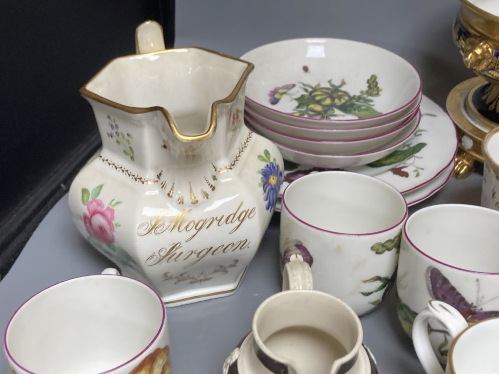 A collection of 19th - 20th century ceramics, including a Coalport floral painted jug, mugs, etc.